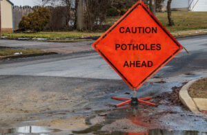 pothole warning sign | pothole complaints