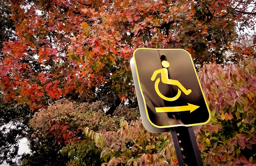 wheel chair traffic sign | ADA compliance on pavement