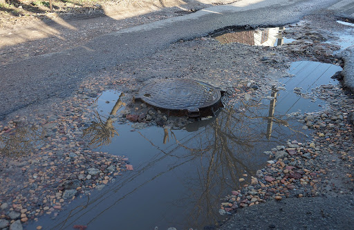 a manhole | puddle repair
