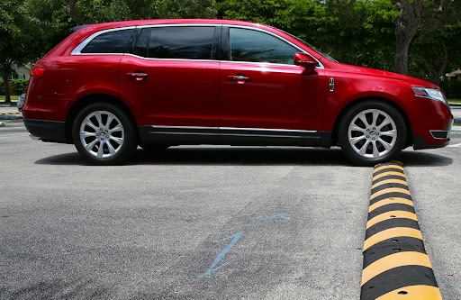 a red car | community speed bumps
